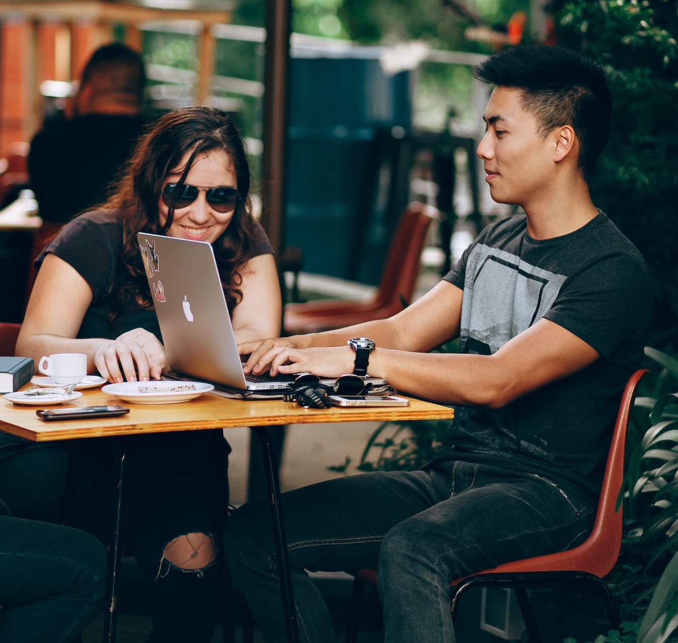 Man and woman on a laptop